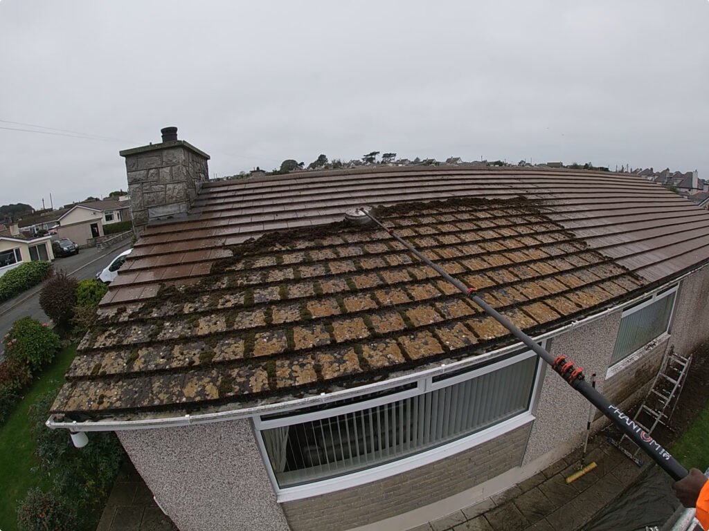 Roof cleaning before and after Rhyl LL19 North Wales by NW Exteriors